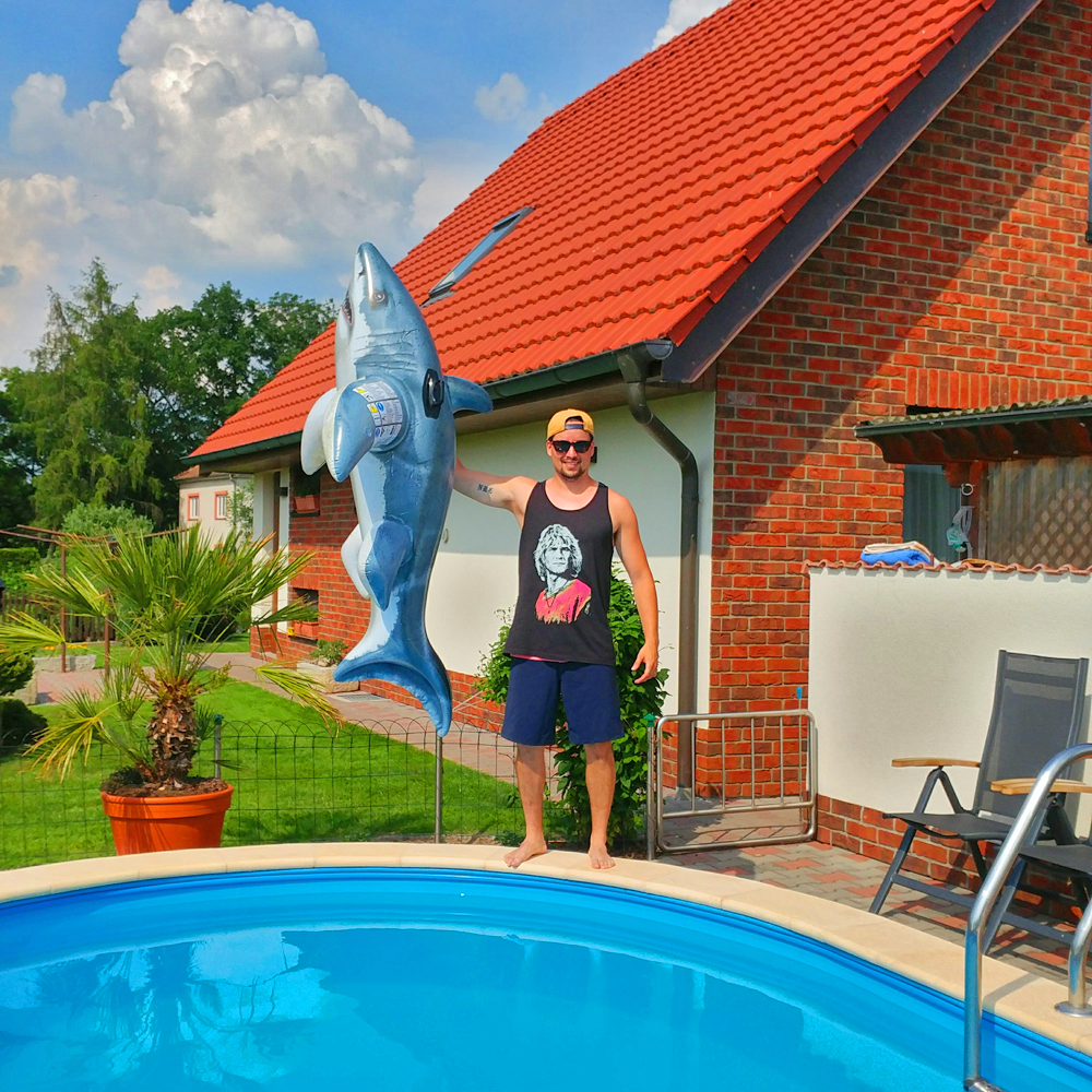 ShirtLoaf bodhi zafa 90s Surfing movie Tank top with inflatable shark at pool